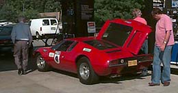 The Mangusta draws a crowd in the gas station.